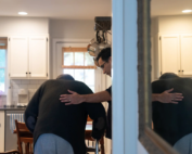 Caregiver offers support to elderly man