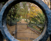 View of park as seen through small opening