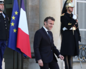 French President Emmanuel Macron leaving the French Assembly building